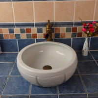 White ceramic bowl of handmade and handpaint for bathroom