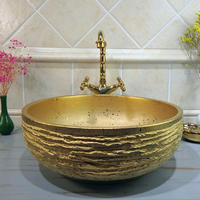 Beautiful designs of shining and matt gold  sinks of round bowl top basins